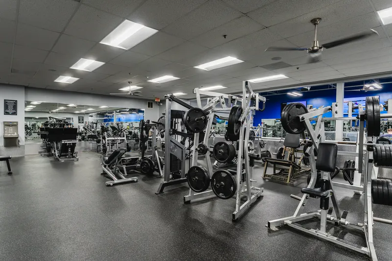 Plate-loaded strength machines on the training floor at Foundation Fitness Annapolis