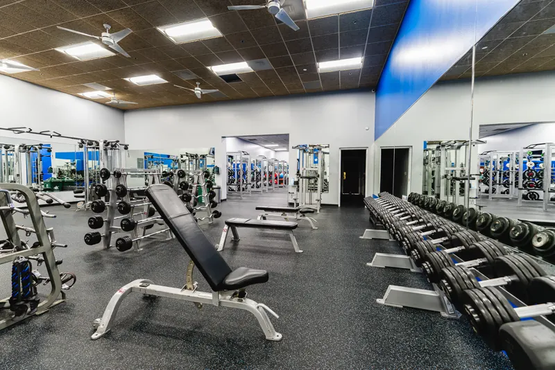 Dumbbell racks and benches at Foundation Fitness of Cambridge