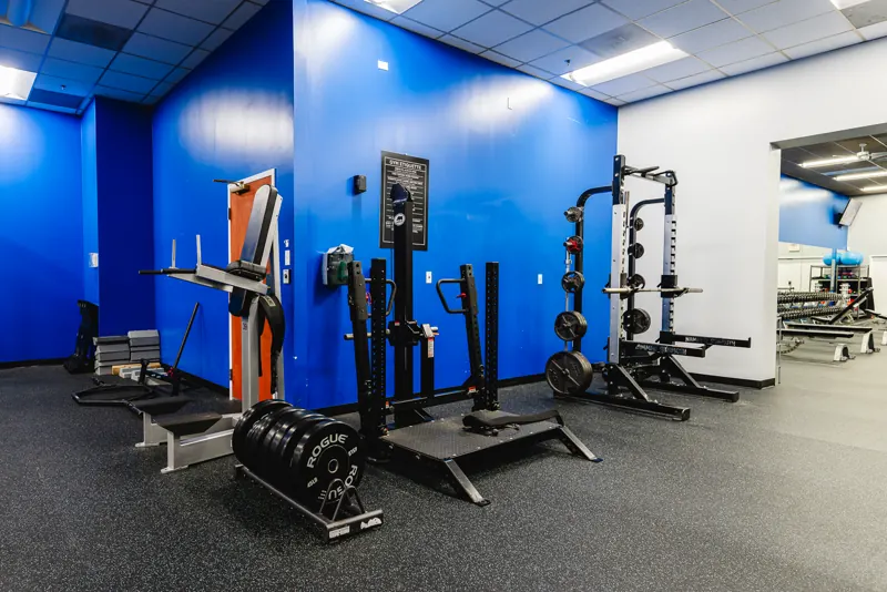 A lifting platform and half rack at Foundation Fitness of Cambridge