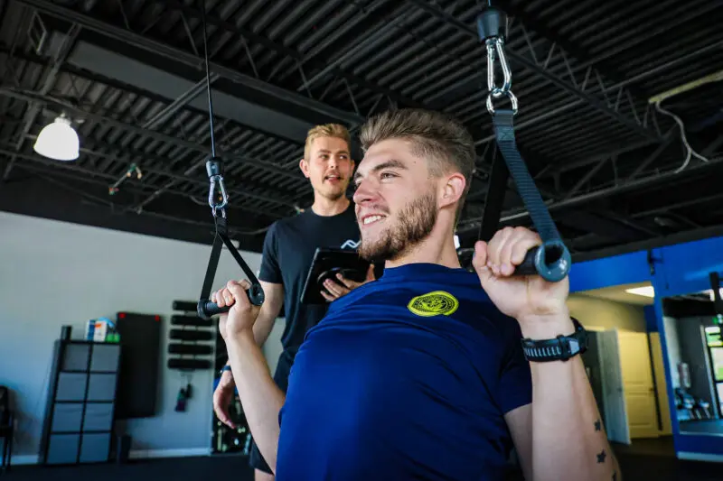 A cable strength machine on the training floor at Foundation Fitness Annapolis